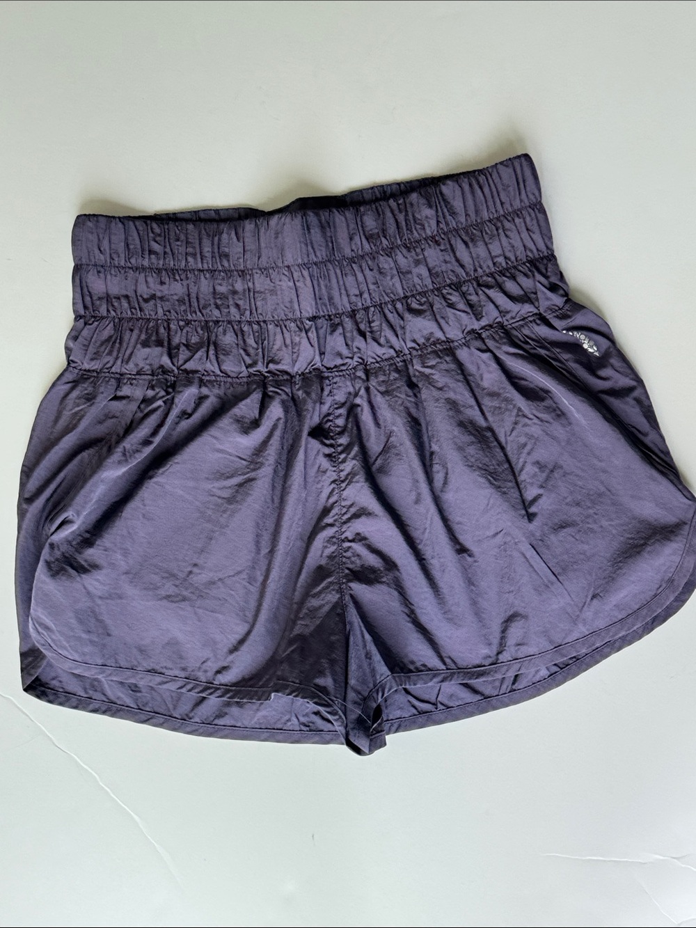 Women's High-Rise Athletic Shorts in iridescent purple